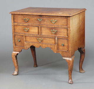 A Queen Anne walnut chest fitted 1 long drawer above an arrangement of 5 drawers, raised on cabriole supports 78cm h x 79cm w x 47cm d 