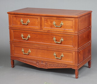 A 20th Century Oriental hardwood chest of 2 short and 2 of drawers with gilt swan neck drop handles raised on shaped supports with carved apron  81cm h x 106cm w x 51cm d 