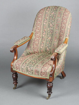 A William IV mahogany open armchair, seat and back upholstered in green striped material, raised on turned supports 98cm h x 65cm w x 51cm d 