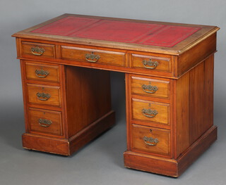 A Victorian mahogany pedestal desk with inset red leather writing surface above 1 long and 8 short drawers 74cm h x 107cm w x 60cm d 