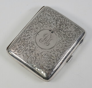 A silver cigarette case with engraved decoration and monogram Birmingham 1918, gross weight 89 grams 