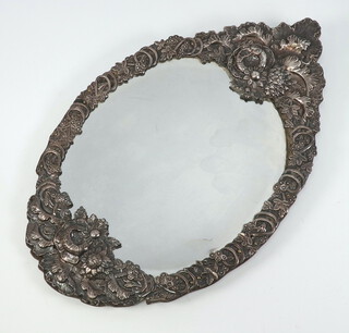 A white metal repousse photograph frame with floral decoration 36cm 