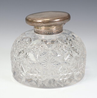 A Victorian cut glass inkwell with a silver lid London 1893, 10cm 