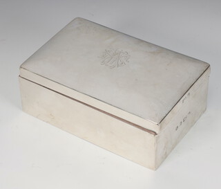 An Edwardian rectangular silver cigarette box with engraved monogram, Birmingham 1901, 14cm 