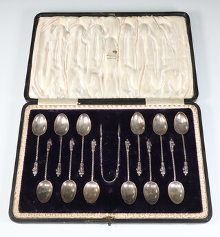 A set of 12 silver apostle spoons and sugar tongs, Birmingham 1908, 121 grams, in a fitted case 