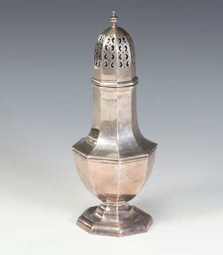 An Edwardian silver octagonal sugar shaker, Sheffield 1920 by Walker and Hall, 252 grams, 23.5cm 