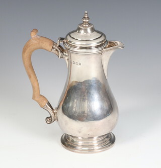 A Queen Anne style coffee pot with beech handle, London 1934, gross weight 292 grams, 18cm 