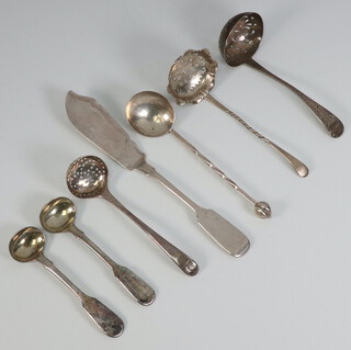 A Victorian silver Old English butter knife London 1898, 3 sifter spoons, 2 mustard spoons and a hammered spoon, 135 grams 