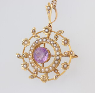 A 9ct yellow gold necklace 40cm with a 15ct yellow gold amethyst and seed pearl pendant, the chain 2.3 grams, the pendant 5.7 grams 