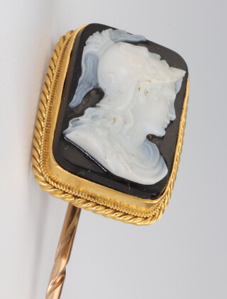 A 19th Century gilt metal tie pin with cameo portrait bust of a gentleman contained in a leather case 