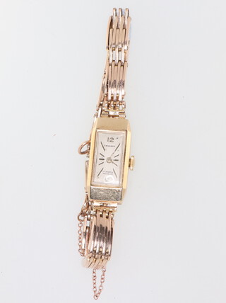 A lady's Excalibur 9ct yellow gold wristwatch contained on a yellow metal bracelet, gross weight including glass 12.5 grams 