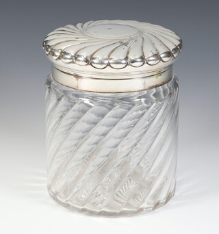 An impressive Victorian silver mounted glass biscuit barrel with repousse swirling lid, London 1896, 16cm 