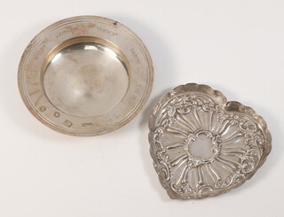 An Edwardian repousse silver heart shaped dish London 1903, 10.5cm and a silver Armada dish London 1974, 156 grams 