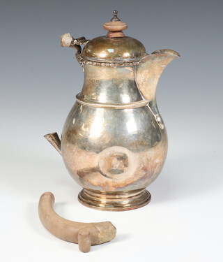 A silver bulbous hot water jug with wooden mount, gross weight 287 grams, rubbed marks, (handle detached) 