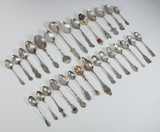 A quantity of 925 standard and sterling silver souvenir spoons, 383 grams 