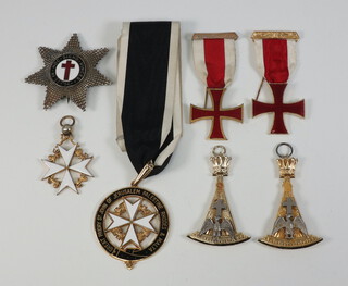 A Masonic gilt metal and enamel Great Priory of Malta collar jewel, a Knights Templar base metal star, 2 ditto breast jewels, a Knight of Malta breast jewel and 2 Rose Croix collar jewels (1 f) 