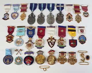 A collection of Masonic gilt metal and enamelled charity jewels 