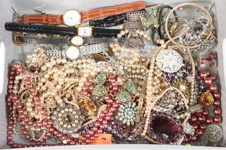 A quantity of vintage costume jewellery and watches 