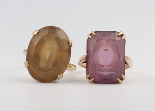 Two 9ct yellow gold smoky quartz rings, size L and N, 12.1 grams 
