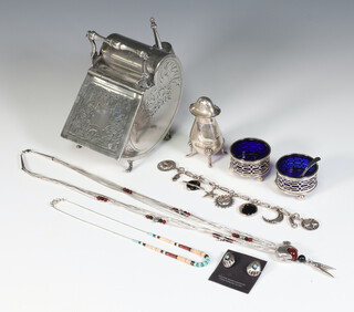 A novelty silver plated sugar box in the form of a coal scuttle with shovel, 3 silver condiments and minor costume jewellery  