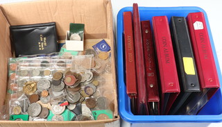 Five albums of world coins together with a collection of commemorative crowns and medallions 