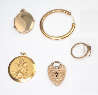 A yellow metal 9ct St Christopher pendant, 1 other pendant, 2 earrings, a padlock clasp and a hoop earring, 11.3 grams 