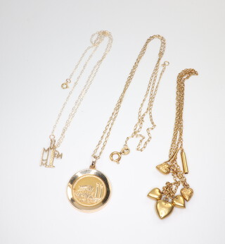 A yellow metal 585 pendant, a yellow metal heart necklace a 585 yellow metal necklace 46cm and a 9ct ditto and pendant 35cm, 9ct 0.7 grams, 585 5.6 grams and yellow metal 4.9 grams  11.5 grams 