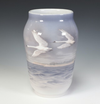 A Royal Copenhagen vase decorated with swans in flight no.83/1973/1217 24cm 