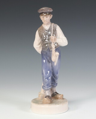 A Royal Copenhagen figure of a standing workman 620/202 22cm 
