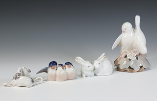 A Royal Copenhagen group of 2 doves 402 14cm, a ditto of 2 white rabbits 518 8cm, 2 mice 521 8cm and 3 birds 1045 8.5cm 