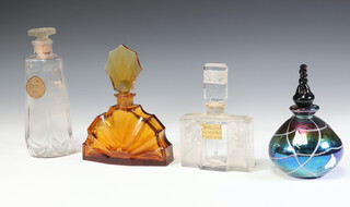 An Art Deco American hexagonal clear glass scent bottle 17cm, a Continental scent bottle decorated with figures - Violetta di Parma 14cm (chipped), an amber glass scent bottle base etched R Lalique 16cm and a modern scent bottle 