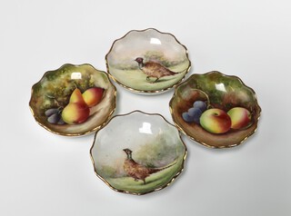 F R Budd, 4 circular porcelain dishes - 2 decorated still life studies of fruits, 2 decorated cock pheasants 8cm, the reverse marked painted by F R Budd (formerly of Royal Worcester) 