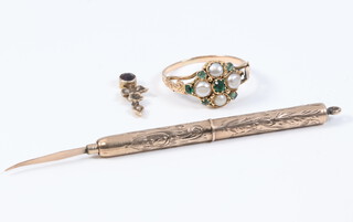 A Victorian yellow metal seed pearl and emerald cluster ring size M together with a gilt pencil and small pendant
