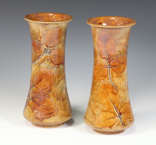 A pair of Royal Doulton stoneware waisted vases decorated with leaves X8531N/7566 23cm 