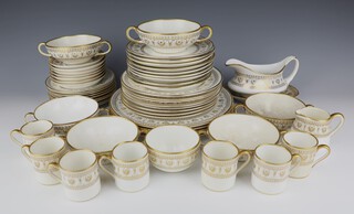 A Crown Staffordshire Gold Victoria pattern part coffee and dinner service with gilt classical motif decoration comprising 7 coffee cans (3 cracked), 7 saucers (2 cracked), 6 two handled soup bowls (3 cracked), 9 saucers (1 second), sauce boat and stand, a cream jug and sugar bowl (cracked), 4 dinner plates (1 cracked), 8 side plates, 9 small plates (1 cracked)  