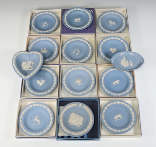 Eleven Wedgwood blue Jasperware dishes decorated with signs of the Zodiac 11cm, 3 other dishes 