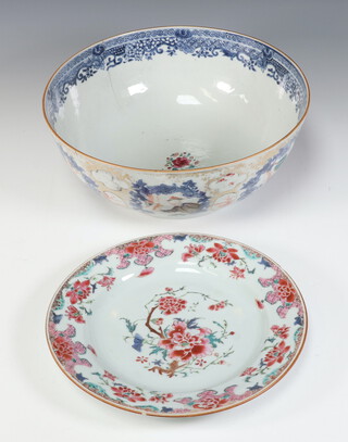 An 18th Century famille rose bowl decorated panels of figures in garden landscapes 26cm (hairline cracks) together with an 18th Century famille rose plate decorated with peony 22cm (chip to rim)