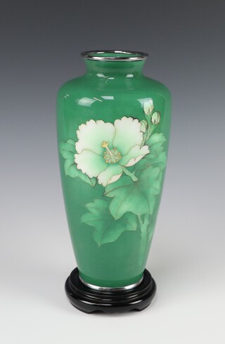 A 20th Century green ground white metal cloisonne enamelled vase decorated a flower 22cm 
