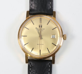 A gentleman's gilt cased Tissot calendar wristwatch the dial inscribed Sea Star on a leather strap 