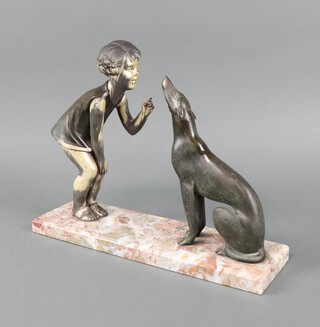 An Art Deco spelter figure group of a crouching girl with dog raised on a rectangular 2 colour marble base 28cm h x 33cm w x 10cm d 
