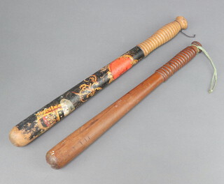 A Victorian turned and painted police truncheon (some paint loss) and 1 other plain turned truncheon 39cm (damage to end) 