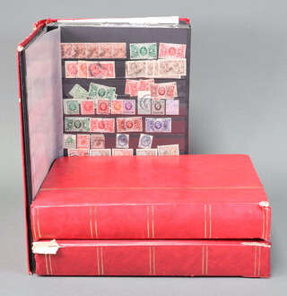 A red stock book of Victorian and later GB mint and used stamps, stock book of New Zealand, Victoria and later mint and used stamps, stock book of Elizabeth II mint and used GB stamps