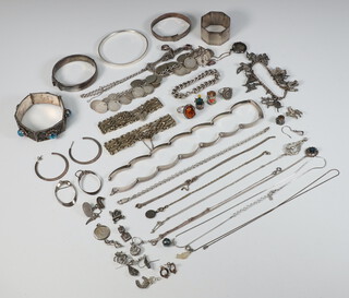 A silver bracelet and minor silver jewellery including bangles, necklaces, earrings etc, gross weight 400 grams 