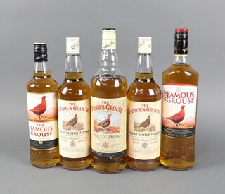 Two 1 litre bottles of The Famous Grouse Finest Scotch Whisky, 40 percent proof and 2 ditto 75cl bottles and a 70cl bottle 