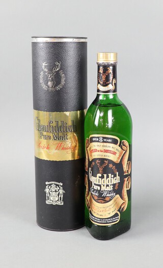 A 26 2/3 fluid ounces bottle of Glenfiddich pure Scotch Whisky, 70 percent proof, in a cardboard tube 