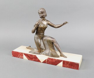 An Art Deco spelter figure of a kneeling lady on a 2 colour marble base 25cm h x 37cm w x 11cm d  