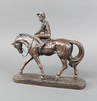 A bronze figure of a racehorse with jockey up 28cm h 