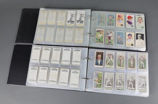 Two albums of cigarette cards of cricketers and sportsman including Ogdens, Players, etc (some restrikes)  