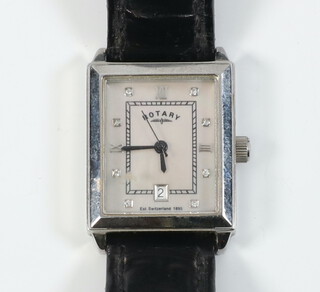 A lady's steel cased Rotary calendar wristwatch with diamond 5 minute markers and calendar aperture on a leather strap, with original box 