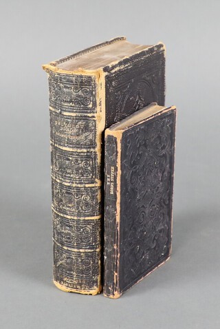 Thomas Wilson DD, 1 volume "The Lord's Supper" published by the society for promoting Christian knowledge 1848, leather bound and 1 volume "The English Version of The Polyglot Bible" published by Samuel Bagster and Sons London, leather bound 